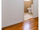 Bathroom with tiled walls, featuring a toilet and sink at 528 Wakefield Dr # A, Charlotte, NC 28209