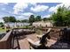 Inviting wood deck with comfortable seating, perfect for outdoor relaxation and entertaining with neighborhood views at 528 Wakefield Dr # A, Charlotte, NC 28209