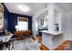 Open floor plan to dining room and kitchen featuring elegant decor with hardwood floors, creating a cohesive space at 528 Wakefield Dr # A, Charlotte, NC 28209