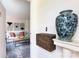 Hallway view into living room featuring stylish decor at 528 Wakefield Dr # A, Charlotte, NC 28209