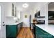 Well-designed kitchen with white subway tile, modern appliances, and custom cabinets offers both style and functionality at 528 Wakefield Dr # A, Charlotte, NC 28209