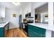 Kitchen showcasing modern appliances and fixtures, white countertops, and custom cabinetry perfect for cooking and entertaining at 528 Wakefield Dr # A, Charlotte, NC 28209