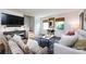 Inviting living room featuring stylish decor, comfortable seating, and sunlight at 528 Wakefield Dr # A, Charlotte, NC 28209