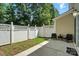 Fenced backyard with a patio and seating area at 529 River Park Rd, Belmont, NC 28012