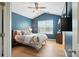 Comfortable bedroom with vaulted ceiling, wooden floors and plenty of natural light at 529 River Park Rd, Belmont, NC 28012