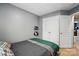 Cozy bedroom with neutral walls, twin closets, and carpet for sale at 529 River Park Rd, Belmont, NC 28012