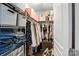 Walk-in closet with ample shelving, clothing rods, and space for storage bins at 529 River Park Rd, Belmont, NC 28012