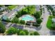 Aerial view of a community pool with chairs and a clubhouse at 529 River Park Rd, Belmont, NC 28012