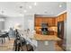 Spacious kitchen featuring granite countertops, stainless steel appliances, and a breakfast bar with seating at 529 River Park Rd, Belmont, NC 28012