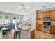 Modern kitchen featuring stainless steel appliances, granite countertops, and an open layout for easy entertaining at 529 River Park Rd, Belmont, NC 28012