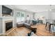 Inviting living room with a fireplace, comfortable seating, and natural light, ideal for relaxing and entertaining at 529 River Park Rd, Belmont, NC 28012