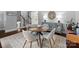 Cozy dining room features a round table, stylish chairs, and a decorative buffet, perfect for intimate gatherings at 6733 Candlewood Dr, Charlotte, NC 28210