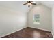 Bright bedroom featuring a ceiling fan and window allowing natural light at 7627 Sarah Dr, Denver, NC 28037