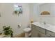 Powder room with stylish sink, fixtures, and decor accents at 8042 Saluda Dr, Charlotte, NC 28269