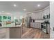 Open kitchen with stainless steel appliances and plenty of counter space at 8042 Saluda Dr, Charlotte, NC 28269