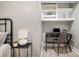 This secondary bedroom features wood floors, a desk, shelving, and a full bed at 8135 Cedar Glen Dr, Charlotte, NC 28212