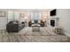 Cozy living room with comfortable seating, fireplace, and bright natural light at 8135 Cedar Glen Dr, Charlotte, NC 28212