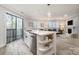 Open-concept kitchen and living room with stylish decor and plenty of natural light at 8135 Cedar Glen Dr, Charlotte, NC 28212