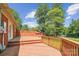 Multi-level wooden deck with railings, providing a perfect space for outdoor gatherings and relaxation at 8706 Richardson King Rd, Waxhaw, NC 28173