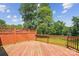 Spacious wooden deck showcasing sturdy railings and ample room for outdoor furniture and gatherings at 8706 Richardson King Rd, Waxhaw, NC 28173