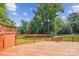 Large wooden deck with railing and lattice accents, perfect for outdoor entertaining and relaxation at 8706 Richardson King Rd, Waxhaw, NC 28173