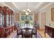 Formal dining room with a large table, elegant chandelier, and beautiful decor at 8918 Beach Bluff Ct, Sherrills Ford, NC 28673