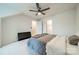 Bedroom with a ceiling fan, neutral walls, carpeted floors, and an ensuite bathroom at 11546 Red Rust Ln, Charlotte, NC 28277