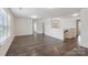 Open bonus room with wood-look floors and natural light at 117 Carmine Ct, Troutman, NC 28166