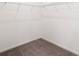 Walk-in closet featuring wire shelving and carpeted flooring, offering practical storage solutions at 117 Carmine Ct, Troutman, NC 28166