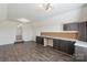 Bonus room area with custom desk and recessed lights at 117 Carmine Ct, Troutman, NC 28166