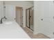 Bright bathroom with walk-in shower and single sink vanity with white countertop at 1266 Langston Ln, Salisbury, NC 28144