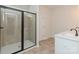 Modern bathroom featuring tiled shower and single sink vanity with white countertop at 1266 Langston Ln, Salisbury, NC 28144