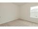 Bright bedroom with neutral carpet, a window, and white walls at 1266 Langston Ln, Salisbury, NC 28144
