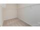 Walk-in closet featuring installed shelving and carpeted floor at 1266 Langston Ln, Salisbury, NC 28144