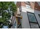 Attractive brick and white condominium building with distinctive signage and modern architectural details at 1315 East Blvd # 225, Charlotte, NC 28203