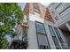 Stylish brick and white condominium building with modern architectural design at 1315 East Blvd # 225, Charlotte, NC 28203