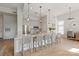 Bright kitchen with large island, stainless steel appliances, and stylish pendant lighting at 1315 East Blvd # 225, Charlotte, NC 28203