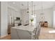 Bright kitchen with large island, stainless steel appliances, and stylish pendant lighting at 1315 East Blvd # 225, Charlotte, NC 28203