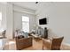 Cozy living room with a comfortable sofa, stylish decor, and natural light at 1315 East Blvd # 225, Charlotte, NC 28203