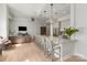 Open-concept living and kitchen area with modern finishes and hardwood floors at 1315 East Blvd # 225, Charlotte, NC 28203