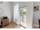 Bright office area featuring hardwood floors and outdoor access, perfect for work and relaxation at 1315 East Blvd # 225, Charlotte, NC 28203