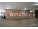 Bright parking garage sign for shops and dining at 1315 East Blvd # 225, Charlotte, NC 28203