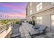 Inviting rooftop patio with lounge chairs and city views is the perfect spot for relaxation and socializing at 1315 East Blvd # 225, Charlotte, NC 28203