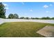 Large backyard with plenty of green space and a privacy fence at 1343 Kent Downs Sw Ave, Concord, NC 28027