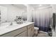 Clean bathroom with double sinks and a shower/tub combination at 1343 Kent Downs Sw Ave, Concord, NC 28027