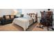 Bedroom with queen bed, sofa, and natural light from a large window at 1343 Kent Downs Sw Ave, Concord, NC 28027