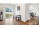 Bright dining area with sliding glass door access to outdoor space and backyard at 1343 Kent Downs Sw Ave, Concord, NC 28027