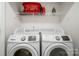 Convenient laundry room with modern front load washer and dryer set at 1343 Kent Downs Sw Ave, Concord, NC 28027
