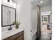 Beautiful bathroom with white subway tiles in the shower and dark hexagonal floor at 1532 Gossage Nw Ln, Concord, NC 28027