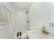 Modern bathroom with glass-enclosed shower and contemporary fixtures at 157 Downey Lake Rd, Dallas, NC 28034